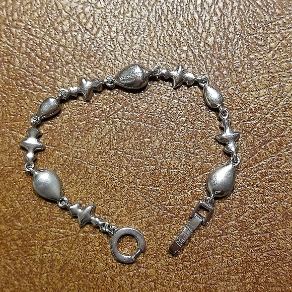 Givenchy silvertone and rhinestone tennis bracelet - Picture 2 of 7